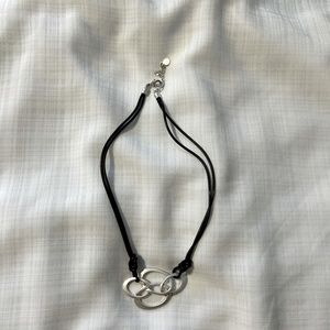 Cord necklace with silver pendent